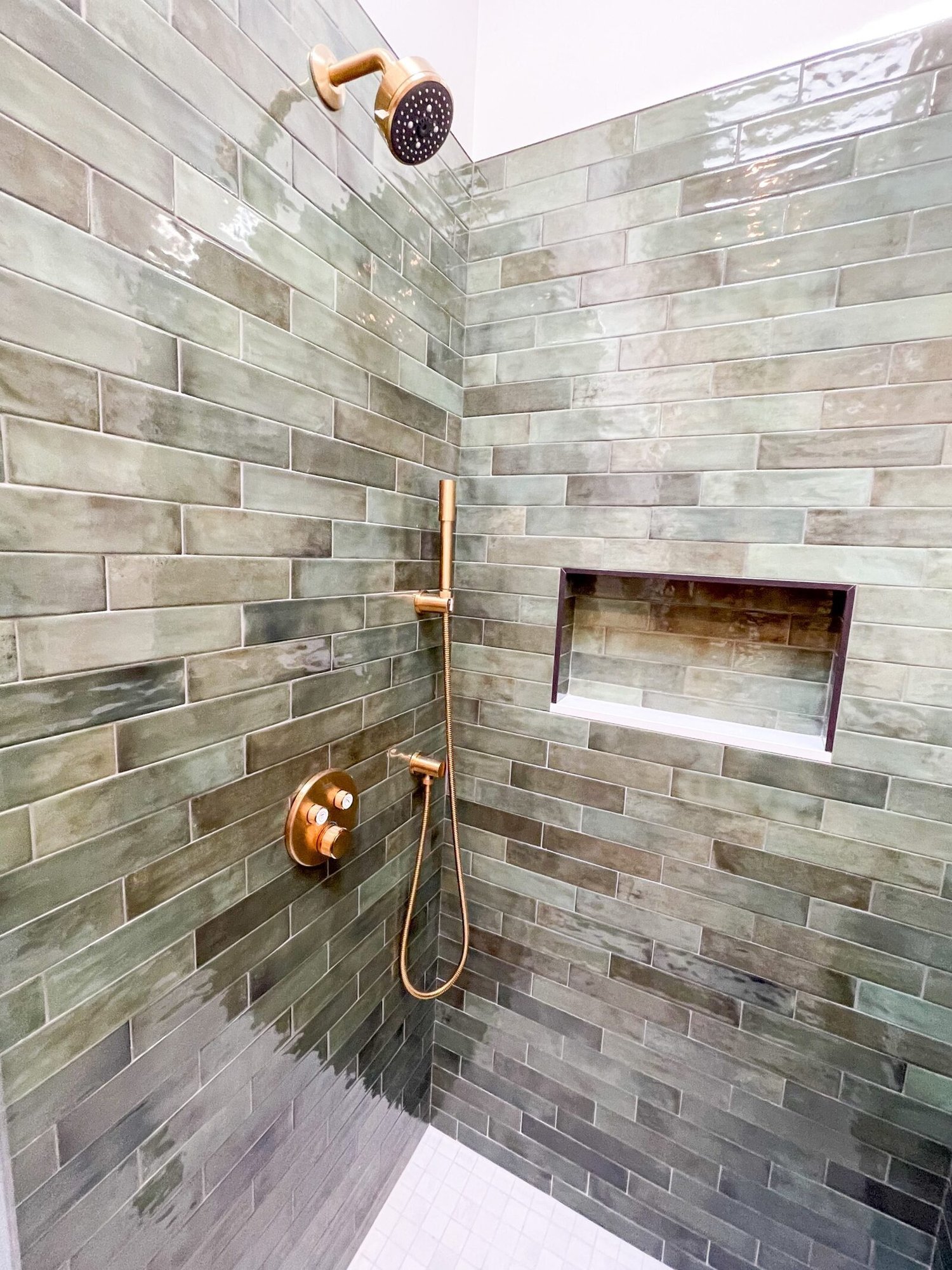 Sawyer-bathroom-green-shower-tile-brass-fixtures